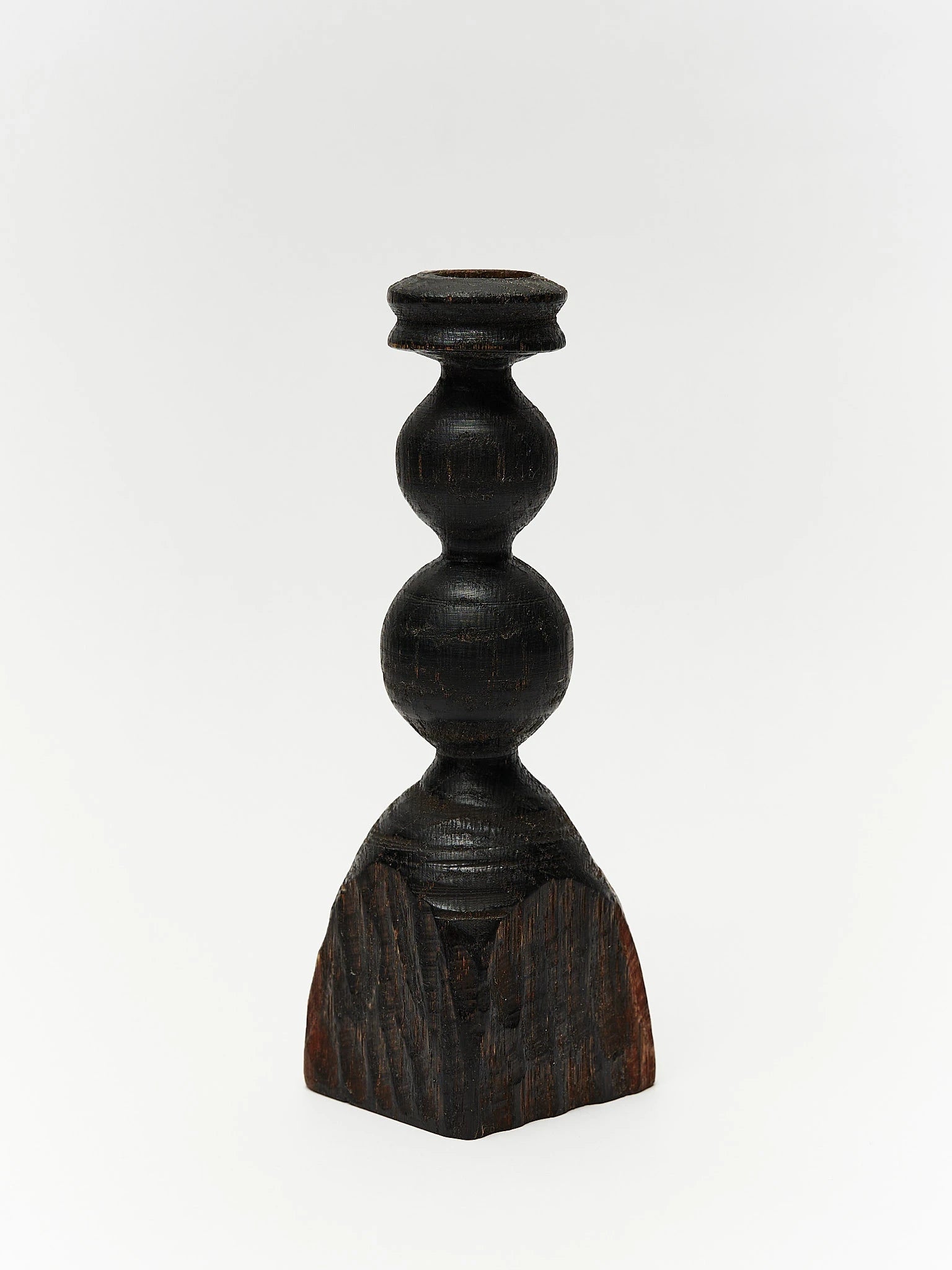 Black stained wood candlestick 