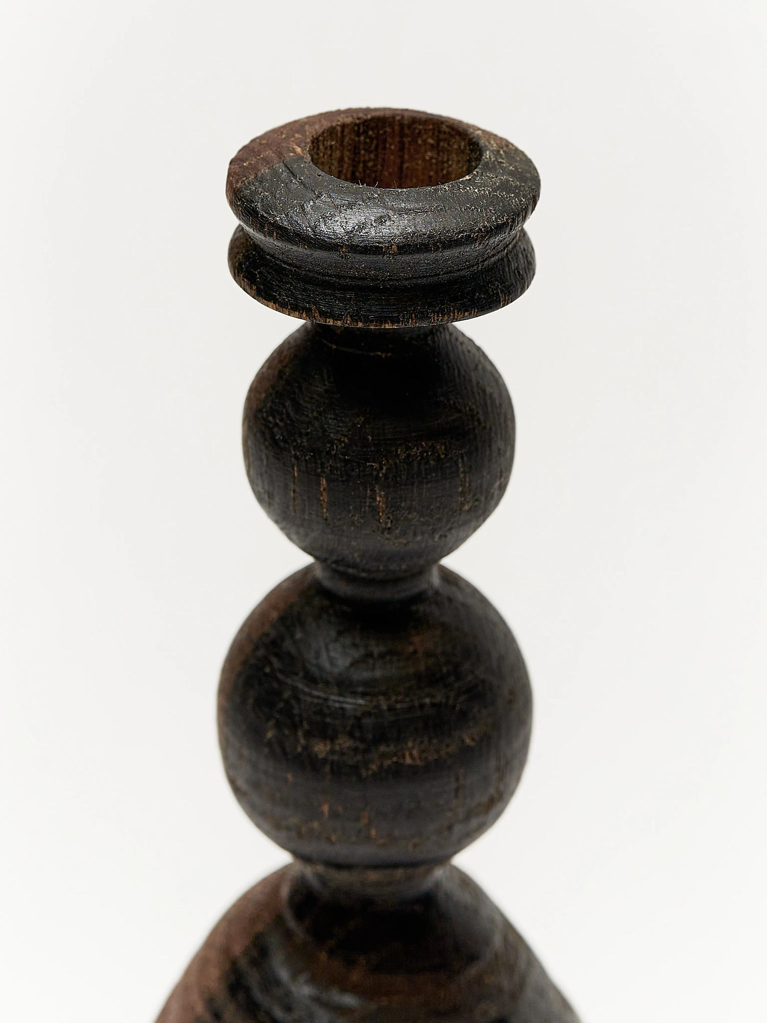 Black stained wood candlestick 