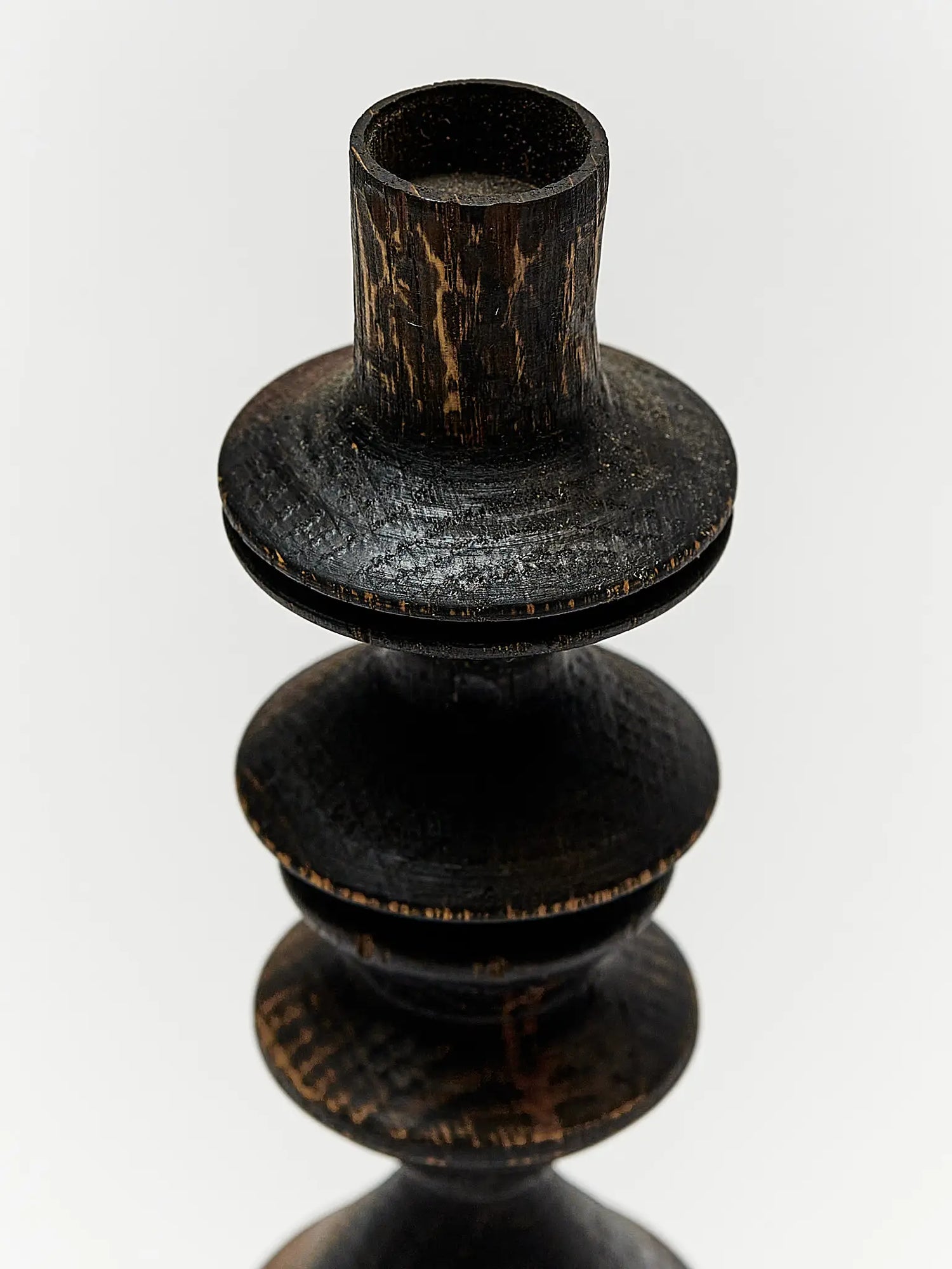 Black stained wood candlestick 