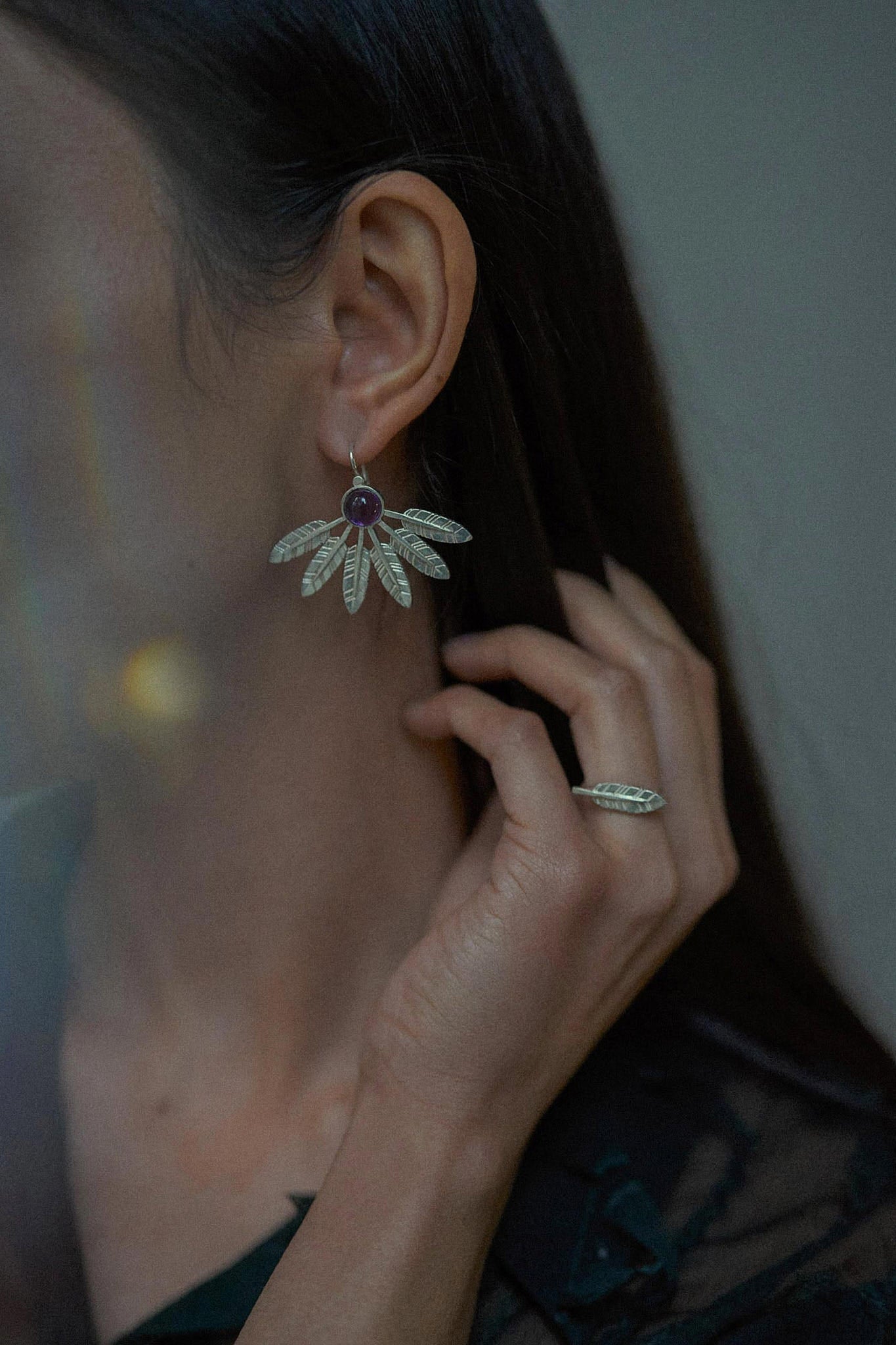 Feather large earrings